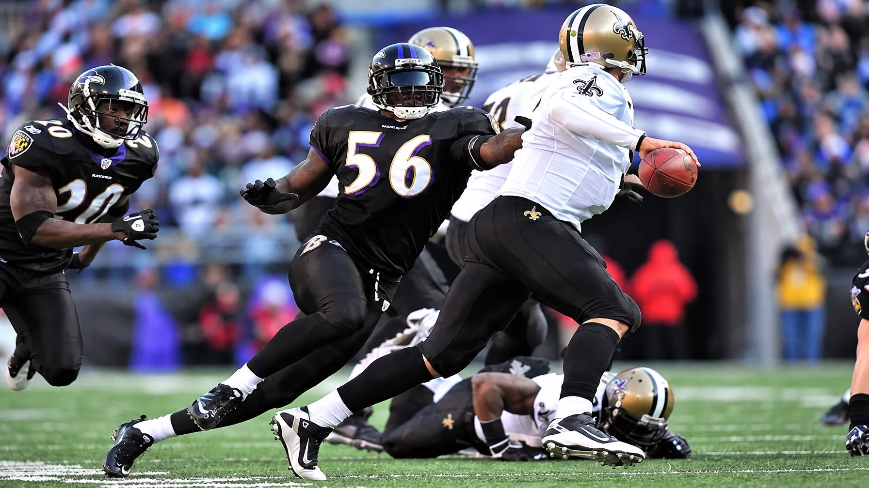 Baltimore Ravens number 56 making a tackle against the Saints